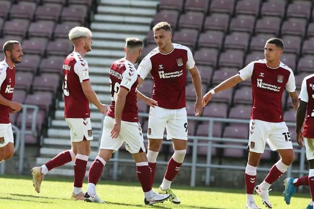 Harry Smith celebrates after converting his penalty. Picture: Pete Norton