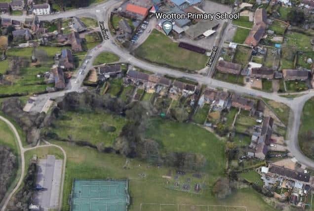 The land to be transferred to the parish council sits to the right of the cemetery on this picture on Google Maps.