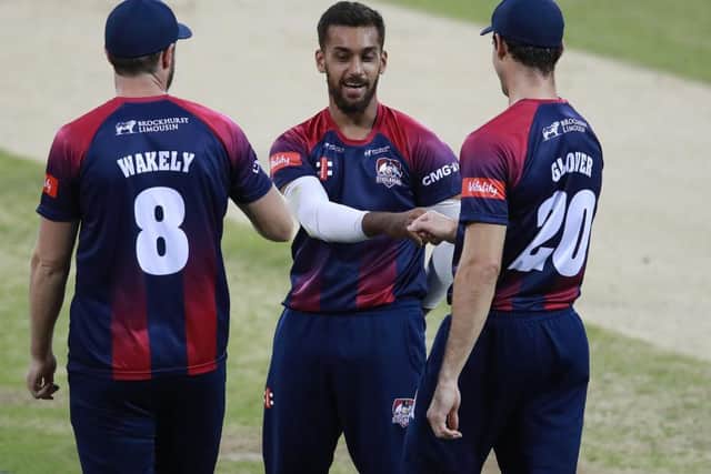 Saif Zaib takes the congratulations after a superb caugfht and bowled