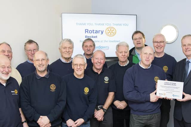 Paul pictured with the Rotary Club in Kingswell Street at the Lowdown charity where the young adult counselling service had a refurbishment thanks to the club's donations.
