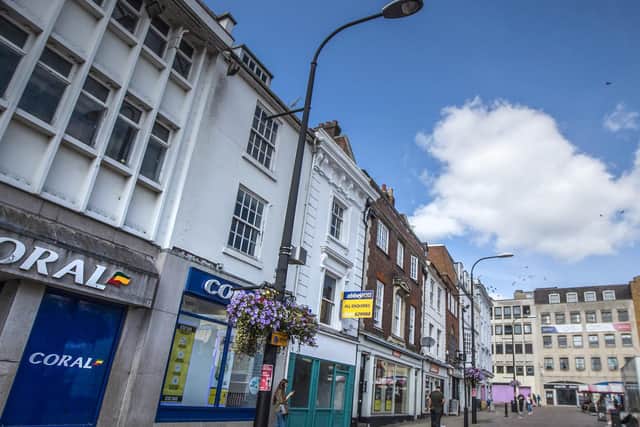 Footfall is slowly increasing in Northampton town centre, a council report has said.