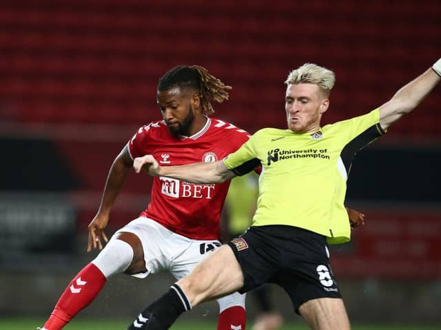 Ryan Watson challenges for the ball against Kasey Palmer. Picture: Pete Norton