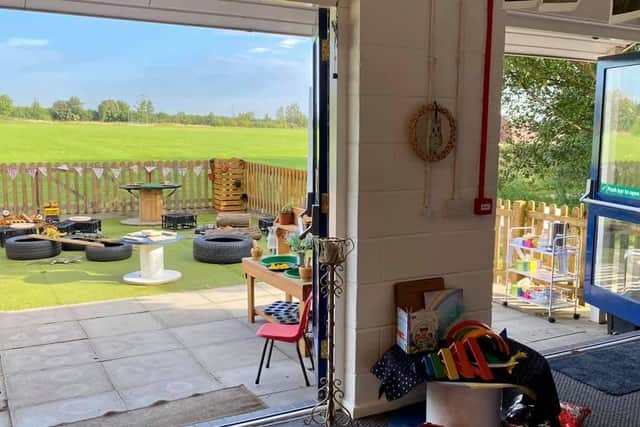 The pre-school has an outdoor space but needs better outdoor equipment.