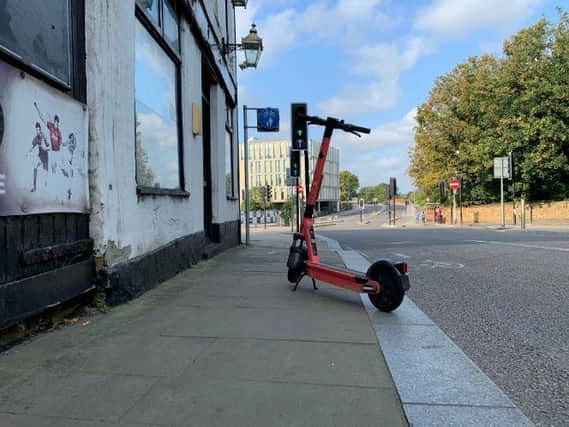 The e-scooters can be left on the pavement but the move has been criticised by members of the public who need full access to the path.