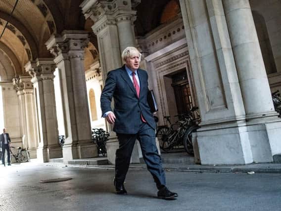 Boris Johnson on his way back to Downing Street after a cabinet meeting on Tuesday morning. Photo: Getty Images