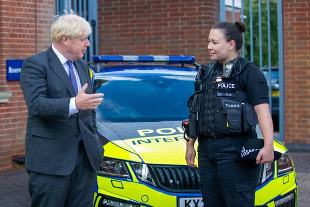 The Prime Minister chats with PC Charlotte Jones during his visit to Northants Police HQ