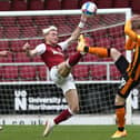 Ryan Watson challenges for the ball during the Cobblers' clash with Hull City (Pictures: Pete Norton)
