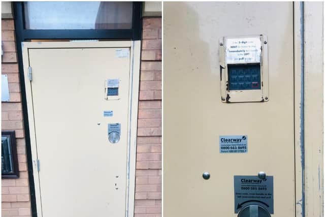 The broken front door at St John's Court, St John's Street, Northampton, from the outside