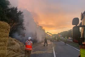 Firefighters battle the burning hay bales on the A14 in Northamptonshire last night. Photos: Northamptonshire Police