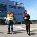 Holly-Anna Coulton and Andy Wood from The Ilex Wood with Iain Swinton, senior operations manager at Amazon's fulfilment centre in Rugeley