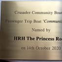 The plaque unveiled for the new boat.