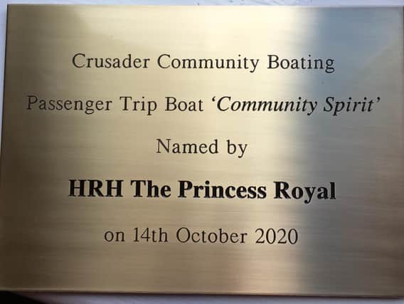 The plaque unveiled for the new boat.
