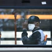 Face coverings have been required by law on buses since June. Photo: Getty Images
