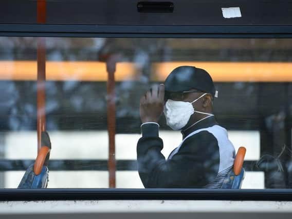 Face coverings have been required by law on buses since June. Photo: Getty Images