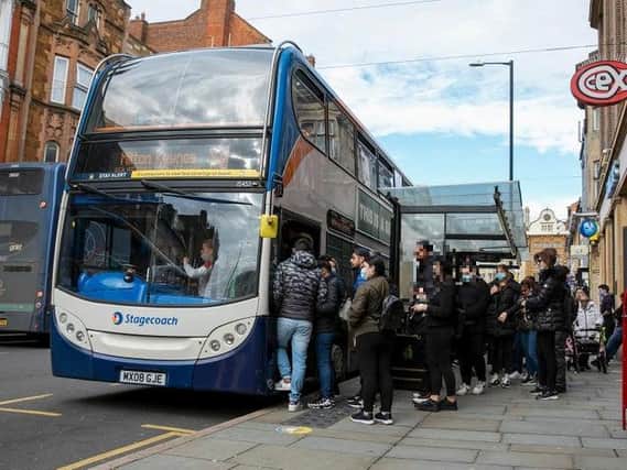 Passengers queuing for a Stagecoach bus in the Drapery. Photo: Leila Coker