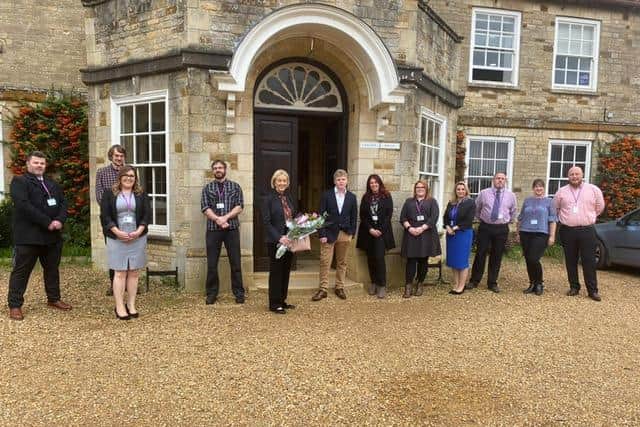 South Northamptonshire MP Andrea Leadsom with Potterspury Lodge School student Samuel Baines and residential, associate and education staff