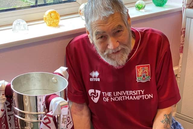Rowland Jordan with the Sky Bet League Two play-off trophy, courtesy of Northampton Town Community Trust