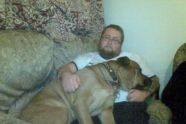 Roger Izzard with his beloved Bullmastiff, Sherru