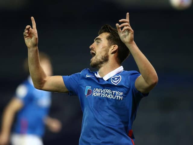 John Marquis celebrates the first of his goals against the Cobblers (Picture: Pete Norton)