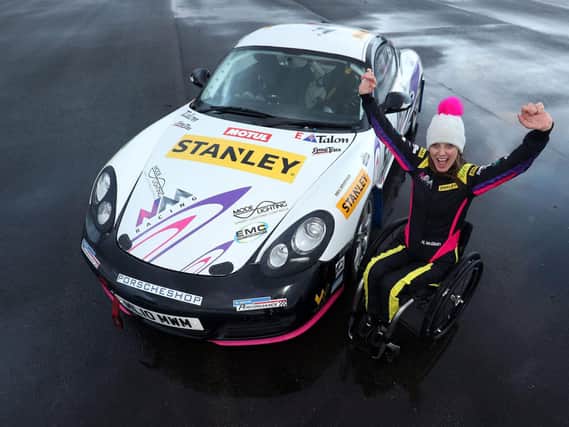 Natalie McGloin races a hand-controlled Cayman S in the Porsche Club Championship