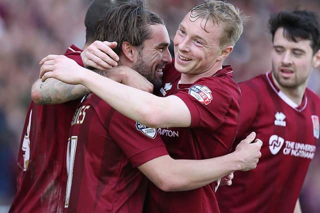 Nicky Adams and Ricky Holmes were instrumental in Town's title success four years ago and they remain in touch with other members of that team, including Brendan Moloney and Cobblers youth coach Marc Richards.