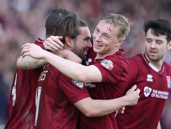 Nicky Adams and Ricky Holmes were instrumental in Town's title success four years ago and they remain in touch with other members of that team, including Brendan Moloney and Cobblers youth coach Marc Richards.