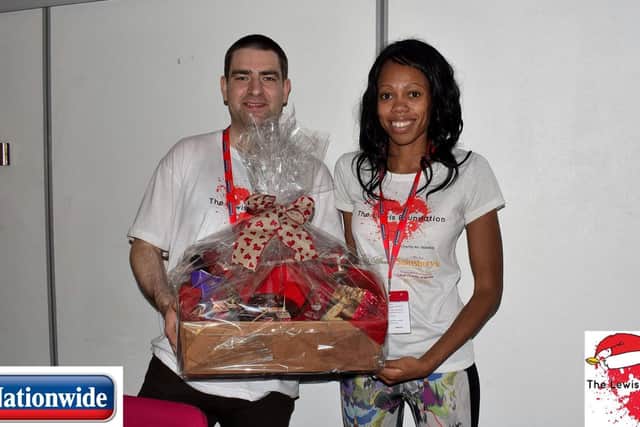 Lee and Lorraine Lewis with a hamper last year.