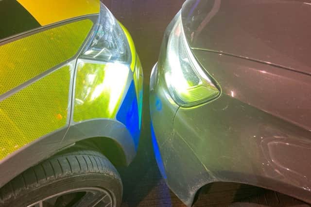 This is how close the two police vehicles got — without adding a scratch — to block the van's getaway