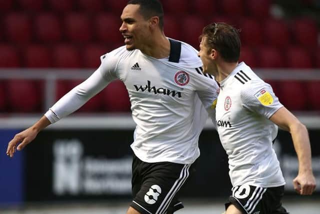 Jon Russell celebrates after scoring for Accrington against the Cobblers (Picture: Pete Norton)
