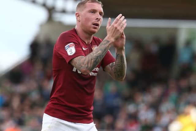 Nicky Adams applauds the fans after being substituted last season...