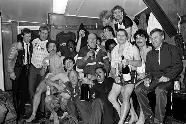Denis Casey (far right) celebrates the Cobblers' promotion from division four in 1987