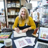 Kardi Somerfield is the face behind Fridge Street which sells its wares online and at Vintage Guru in St Giles Street. Picture by Kirsty Edmonds.