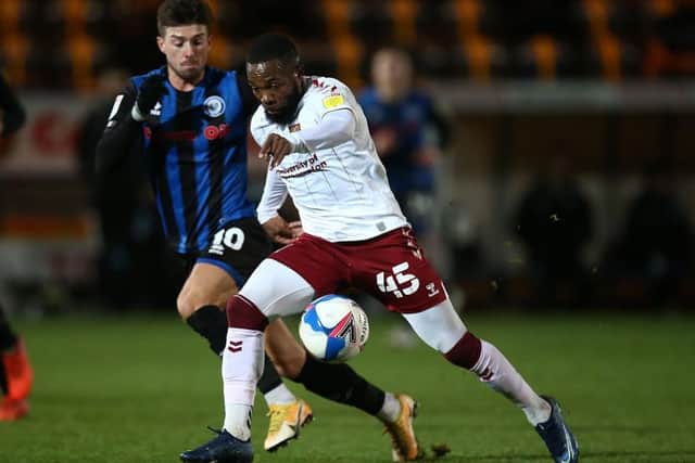 Mark Marshall on the attack for the Cobblers at Rochdale