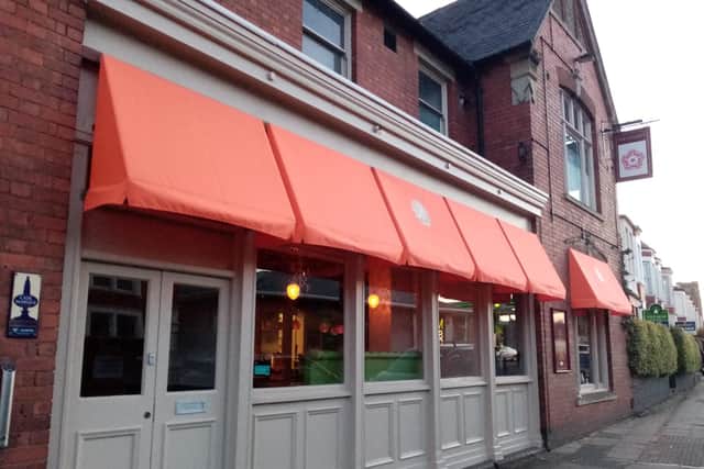 The County Tavern Pub redecorated with some orange awnings - so some readers thought it had been taken over.