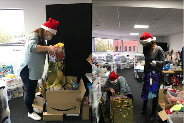 Volunteers are working hard to pack the gits into age appropriate bags for children this Christmas.