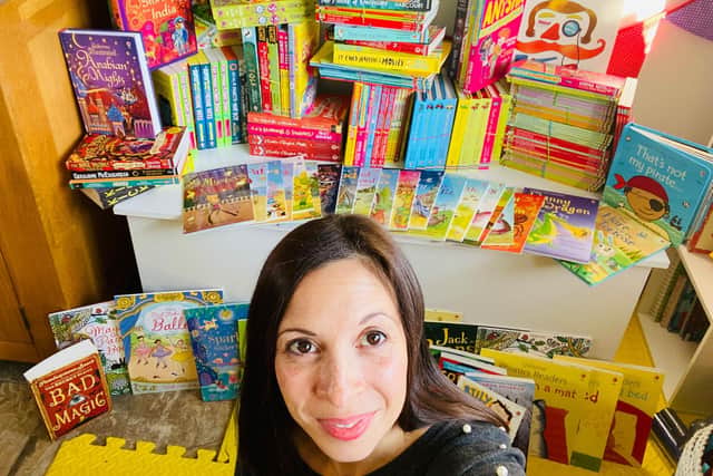 Kate has more than 170 books to deliver to organisations who will hand them out to children this Christmas.