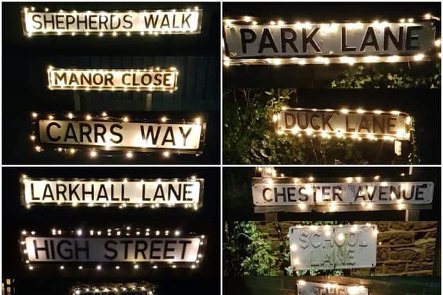 Street signs in Harpole have been covered in Christmas lights by Miranda Clare from the Live and Let Live pub