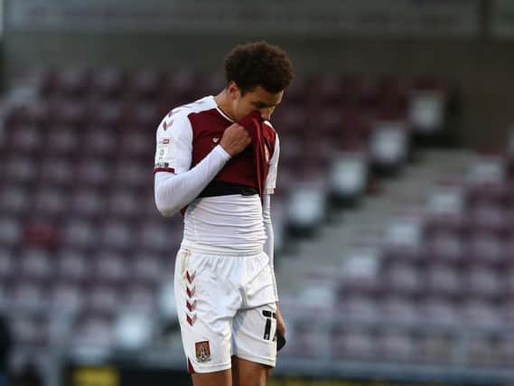 Shaun McWilliams trudges off after his first-half dismissal against Doncaster Rovers (Pictures: Pete Norton)