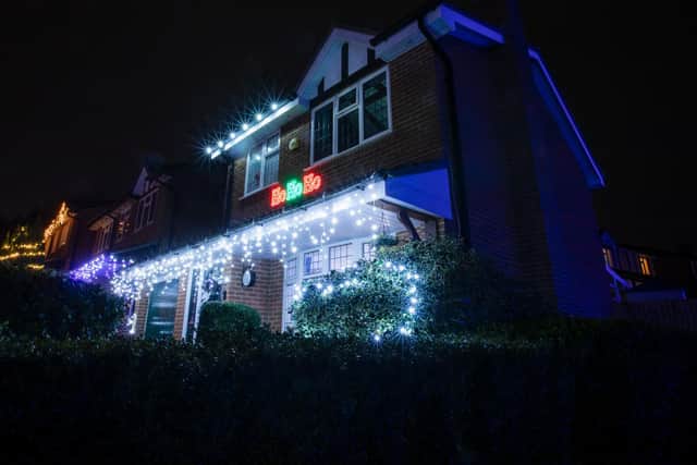 The Buckingham Close residents are all chipping in to make passers-by smile this Christmas with their twinkly display.