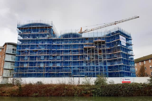 The Lion Court building is nearing completion on the banks of the River Nene.