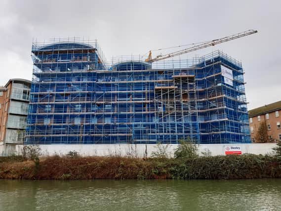 The Lion Court building is nearing completion on the banks of the River Nene.
