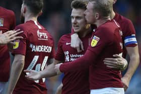 Sam Hoskins and Nicky Adams celebrate the former's goal in the Cobblers' 4-1 win over Crewe in November, 2019