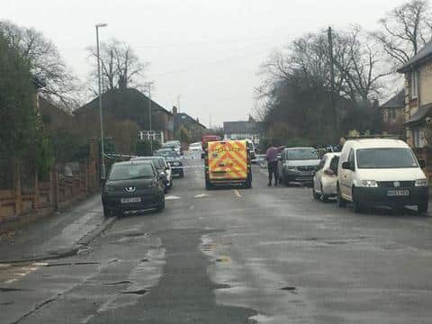 A cordon is in place on Raeburn Road.