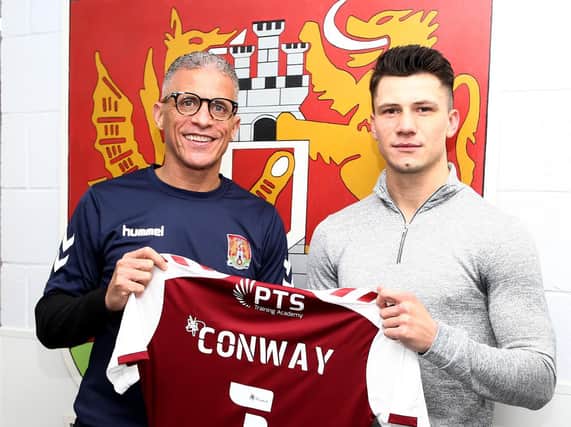Cobblers boss Keith Curle presents Kieron Conway with his Cobblers shirt