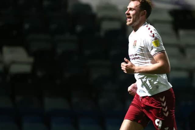 Harry Smith is all smiles after heading home the Cobblers' goal from a Mark Marshall corner in their 1-1 draw at Rochdale
