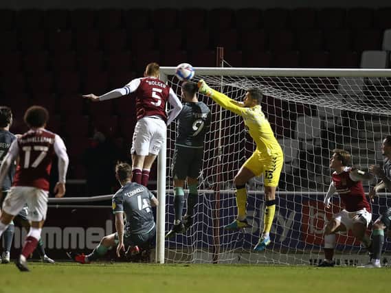 Cian Bolger heads home the only goal of the game against Fleetwood