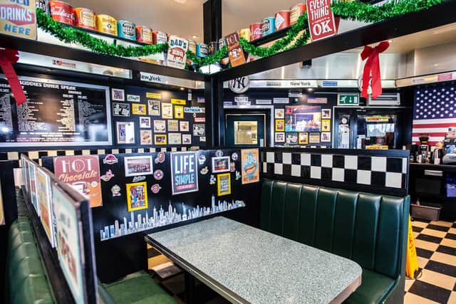 Each table inside the restaurant has its own tall, private booth. Pictures by Kirsty Edmonds.