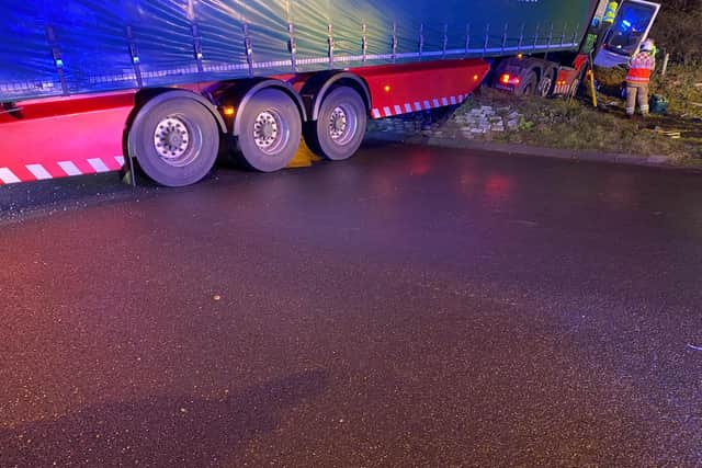 Firefighters and paramedics worked to free the trapped driver after the crash on the A43 near Brackley. Photo: Northants Police