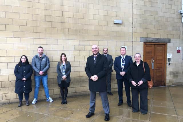 DCI Joe Banfield and his team, with members of Marion Price's family outside Northampton Crown Court today