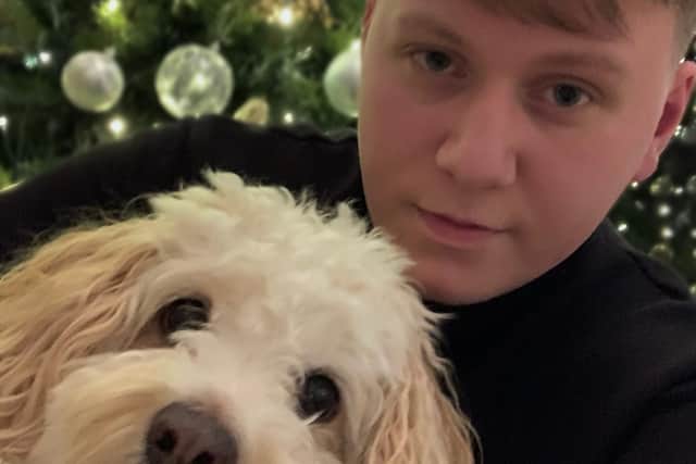 Leo and his Bichon Fris and cavalier King Charles spaniel crossbreed, Poppy.